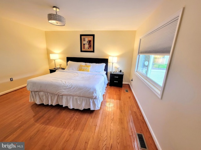 bedroom featuring hardwood / wood-style floors