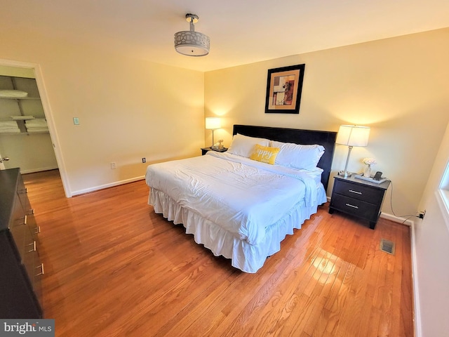 bedroom featuring light hardwood / wood-style floors