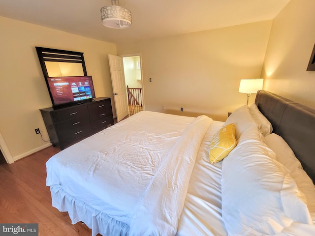 bedroom featuring hardwood / wood-style floors