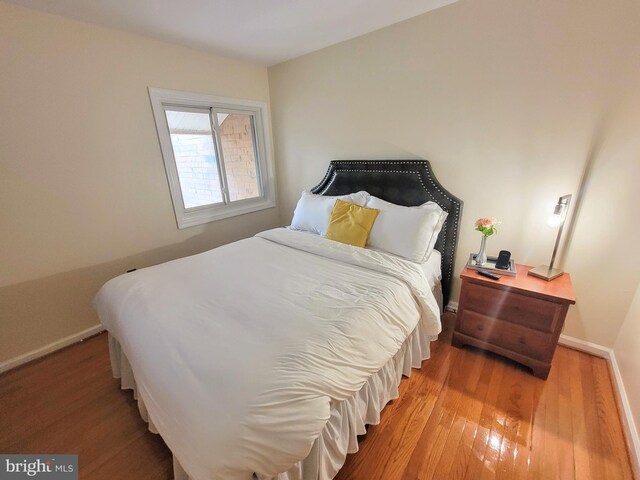 bedroom featuring hardwood / wood-style flooring