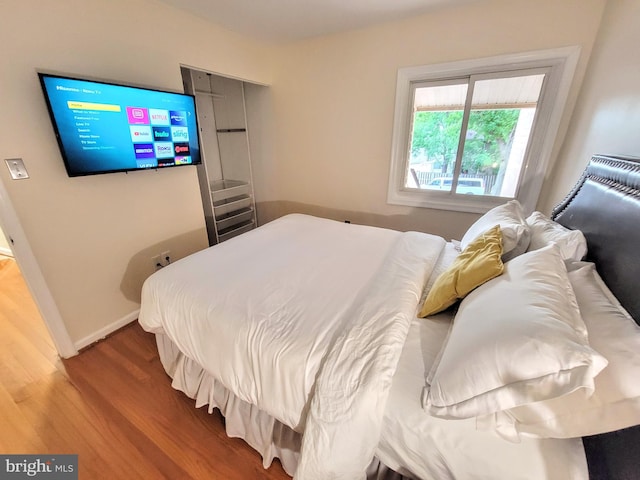 bedroom featuring hardwood / wood-style floors