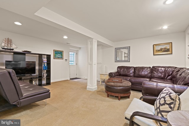 living room featuring light carpet