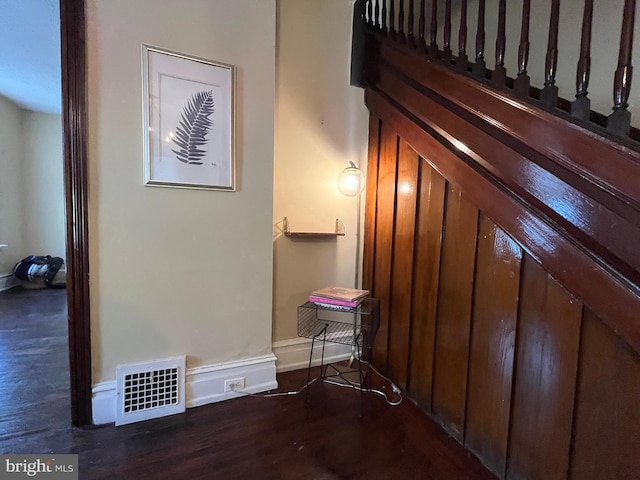 interior space with dark hardwood / wood-style flooring