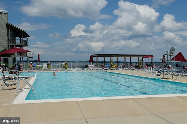 view of swimming pool featuring a patio