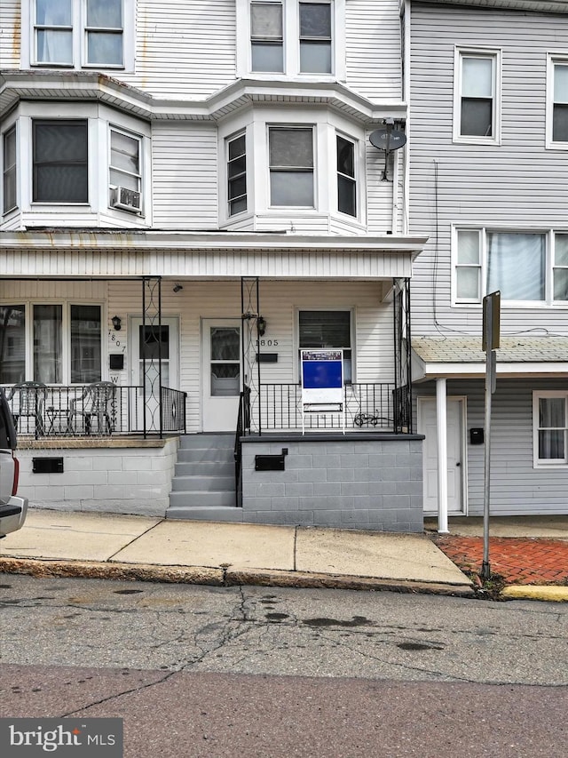 multi unit property with cooling unit and covered porch