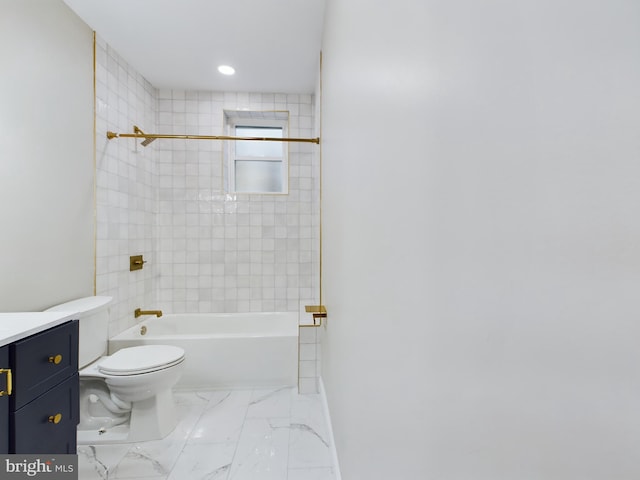 full bathroom with vanity, tiled shower / bath combo, and toilet