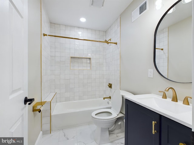 full bathroom with vanity, toilet, and tiled shower / bath combo