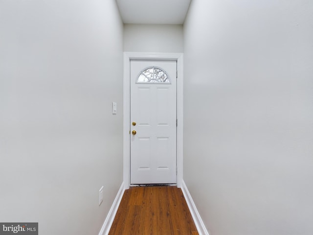 doorway to outside with dark hardwood / wood-style flooring