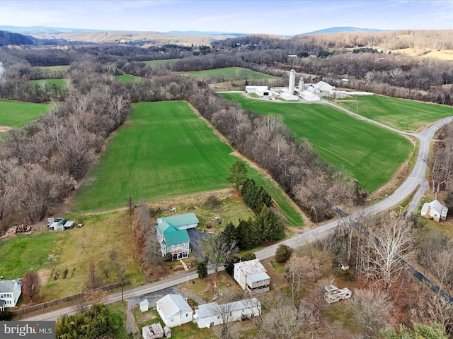 bird's eye view with a mountain view and a rural view