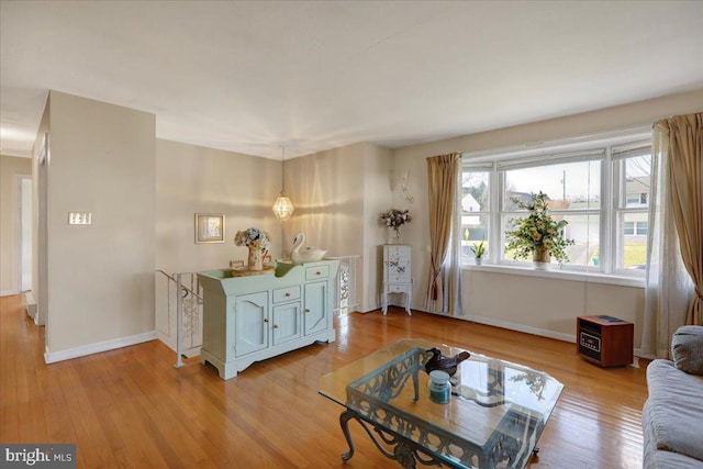 living room with light hardwood / wood-style floors