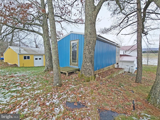 view of outbuilding featuring a garage