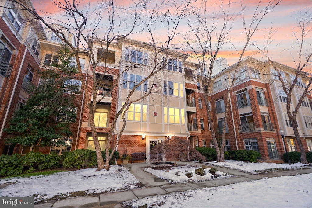 view of snow covered property