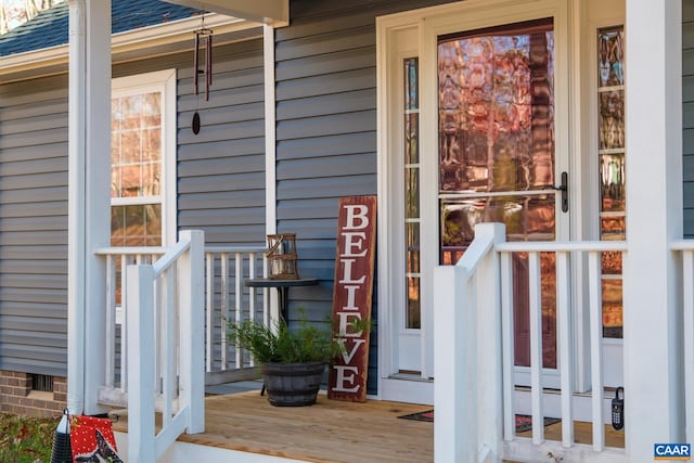 doorway to property featuring a porch