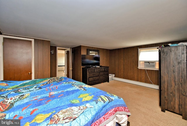 bedroom with light carpet, baseboard heating, cooling unit, and wood walls