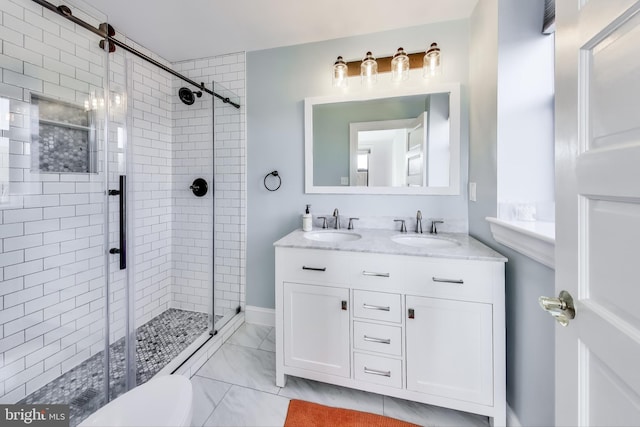 bathroom with vanity, toilet, and a shower with shower door