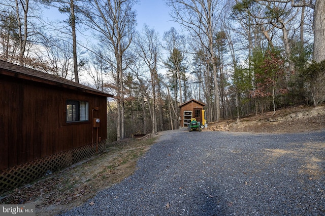 exterior space with a storage shed