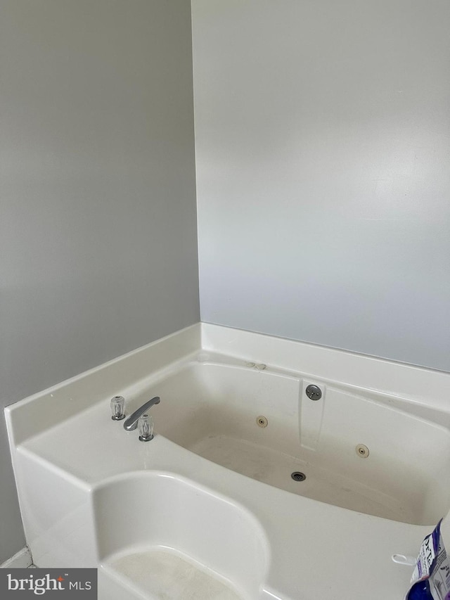 bathroom featuring a tub