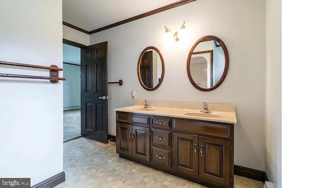 bathroom with vanity, ornamental molding, and a baseboard radiator