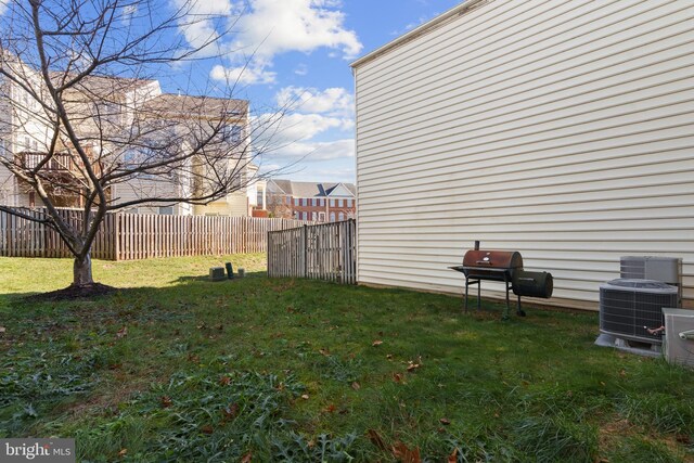 view of yard featuring central AC unit