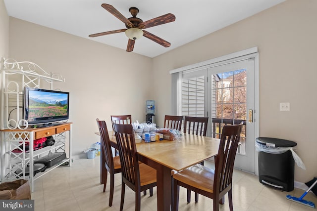 dining space with ceiling fan