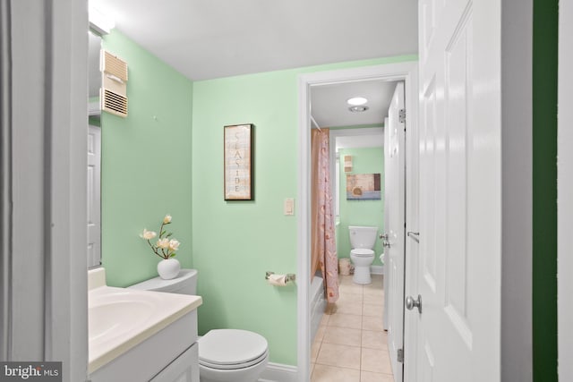 full bathroom with tile patterned flooring, shower / bath combination with curtain, vanity, and toilet