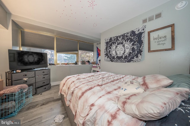 bedroom featuring light hardwood / wood-style flooring