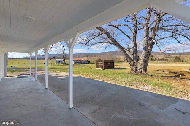 view of patio with a rural view