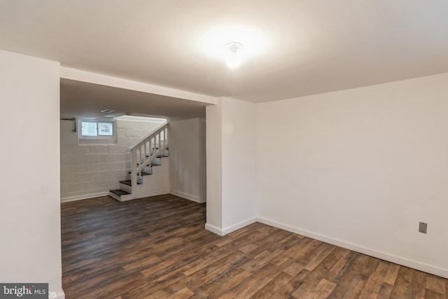 basement featuring dark wood-type flooring