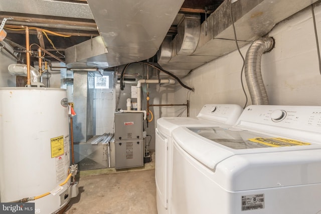 laundry area featuring separate washer and dryer and gas water heater