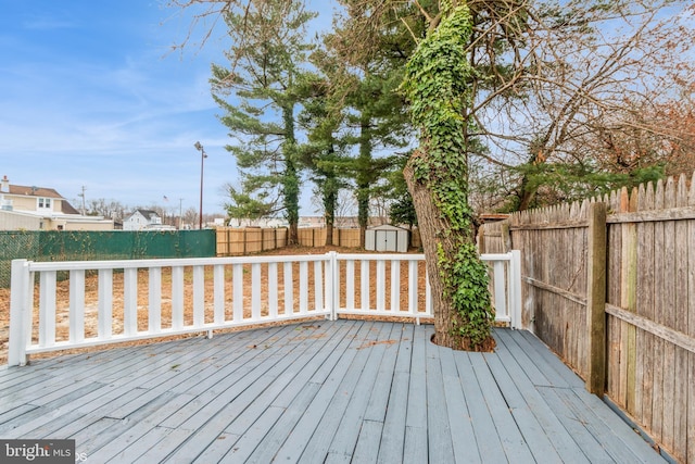 deck featuring a shed