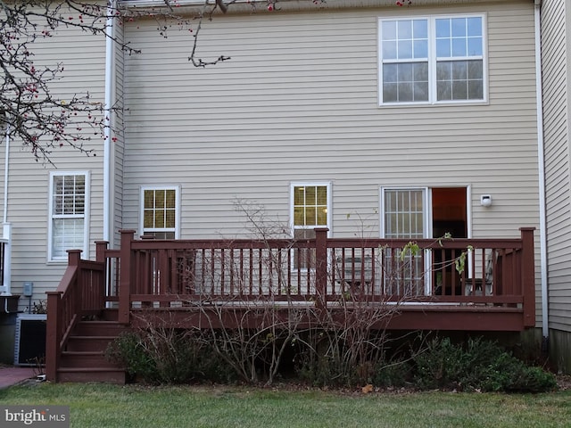 rear view of property with a deck