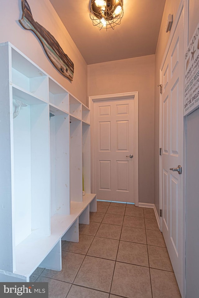 mudroom with light tile patterned floors