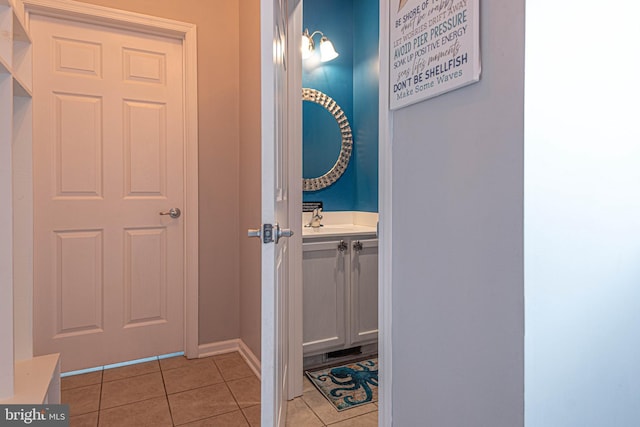 bathroom with vanity and tile patterned floors