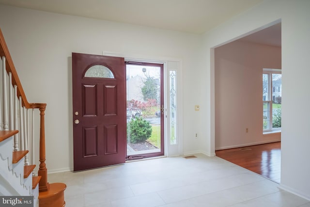 entrance foyer with a healthy amount of sunlight and light wood-type flooring