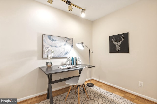 office area with parquet flooring