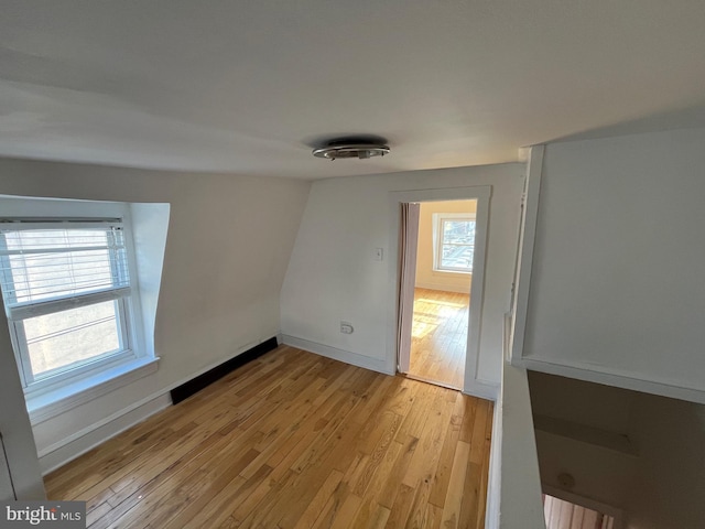 spare room with light wood-type flooring