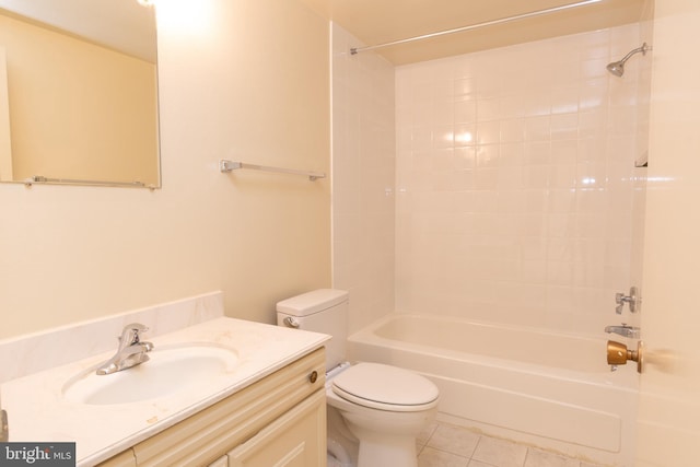 full bathroom featuring tile patterned floors, toilet, vanity, and tub / shower combination