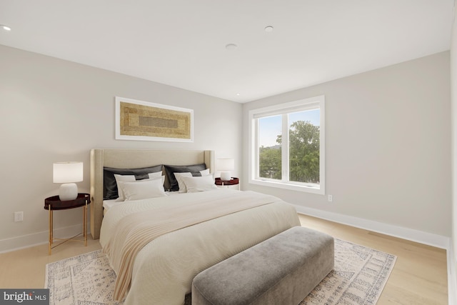 bedroom featuring light hardwood / wood-style floors