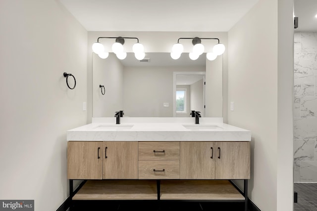 bathroom with vanity and walk in shower