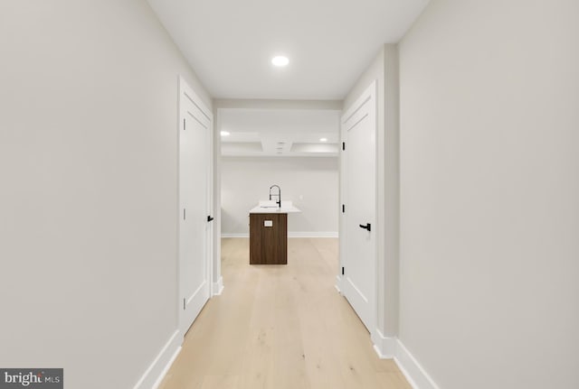 corridor featuring light wood-type flooring