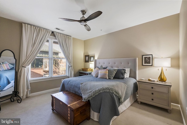 carpeted bedroom with ceiling fan