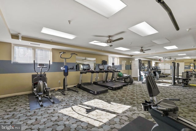 exercise room with carpet flooring and ceiling fan