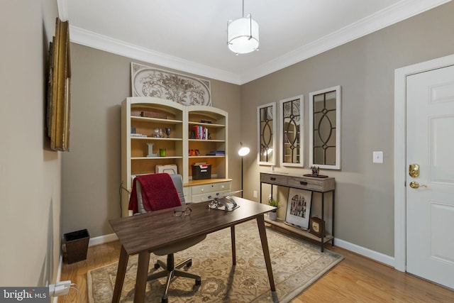 office area featuring crown molding and hardwood / wood-style flooring