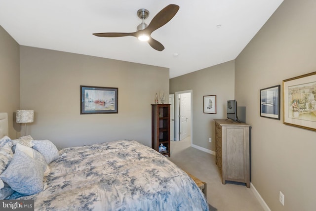 bedroom featuring ceiling fan and light colored carpet