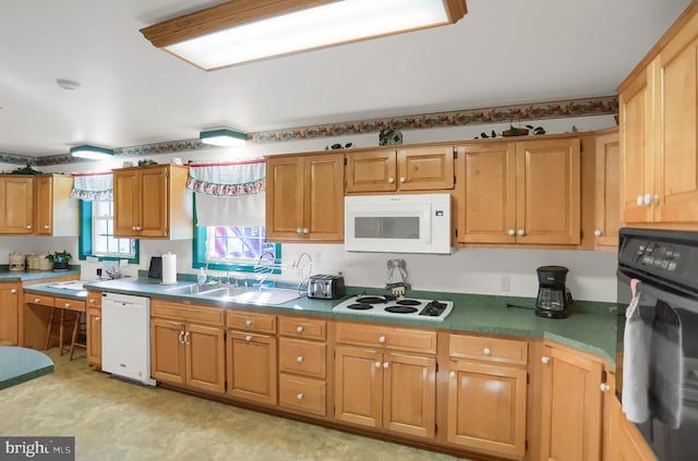 kitchen featuring white appliances and sink