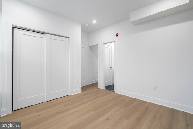 1401 S 13th St, Philadelphia, PA 19147 - unfurnished bedroom featuring light wood-style floors, recessed lighting, baseboards, and a closet