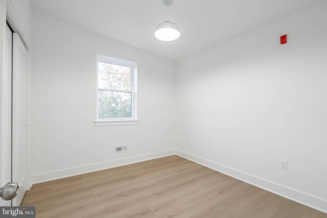 1401 S 13th St, Philadelphia, PA 19147 - unfurnished bedroom featuring light wood-style flooring, baseboards, and a closet