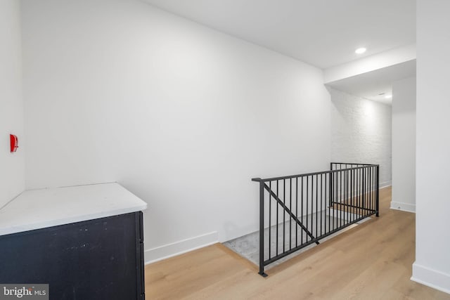 1401 S 13th St, Philadelphia, PA 19147 - hallway featuring an upstairs landing, light wood finished floors, baseboards, and recessed lighting