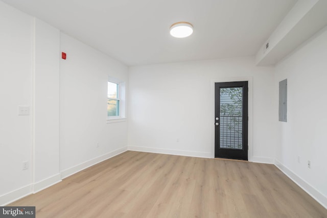 1401 S 13th St, Philadelphia, PA 19147 - foyer entrance featuring electric panel, light wood-style flooring, and baseboards