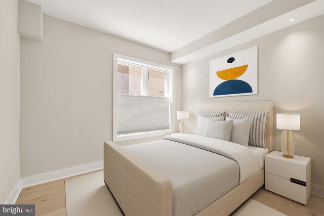 bedroom featuring light wood-type flooring